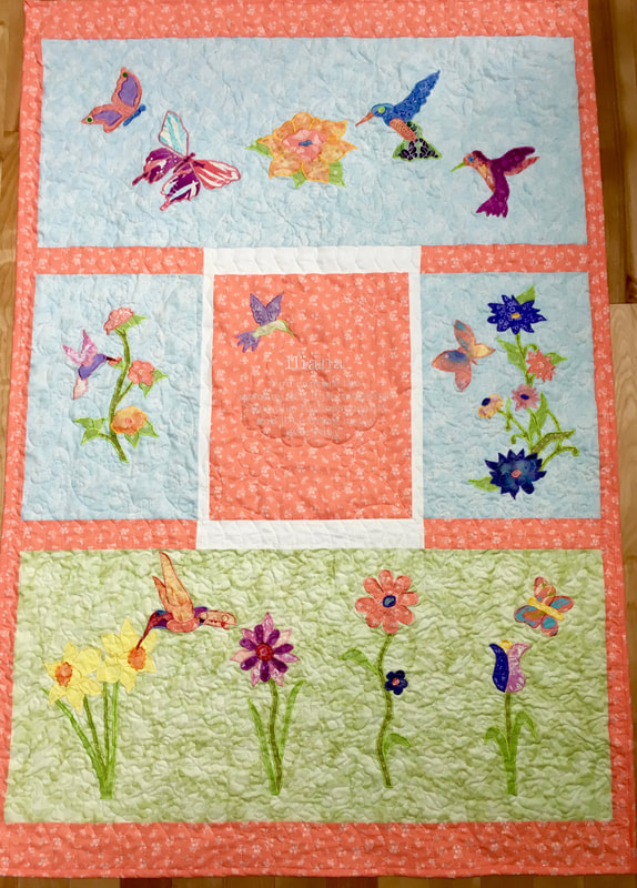 Butterfly and Hummingbird Quilt from http://www.HomeSewnByCarolyn.com 