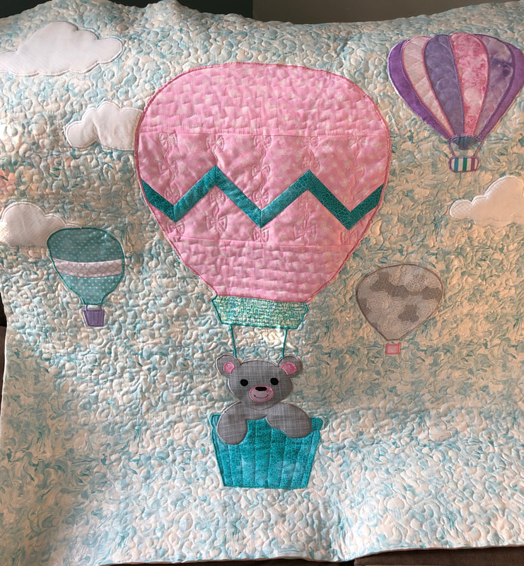 Hot Air Balloon Baby Quilt from http://www.HomeSewnByCarolyn.com/baby-quilts.html 