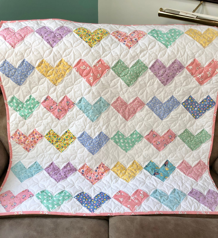 Heart 1930's Reproduction Baby Quilt for sale from http://www.HomeSewnByCarolyn.com/baby-quilts.html