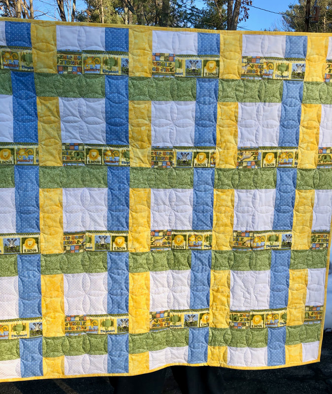 Blue and Yellow Woven Baby Quilt for sale from http://www.HomeSewnByCarolyn.com/baby-quilts.html