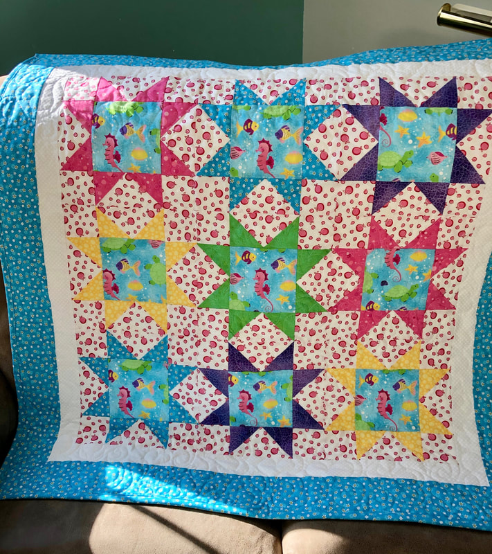 Under the Sea Baby Quilt for sale from http://www.HomeSewnByCarolyn.com