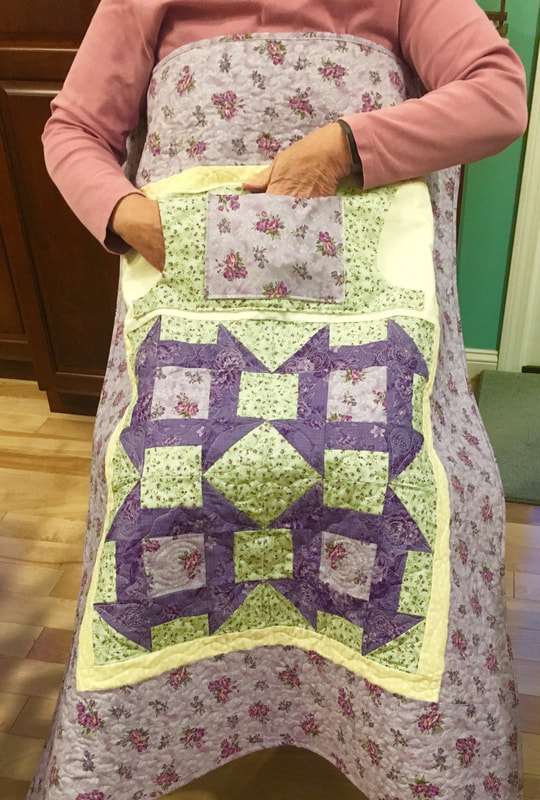 Lavender Lovie Lap Quilt with Pockets from http://www.HomeSewnByCarolyn.com 