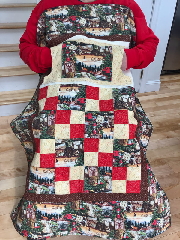 A man's lap quilt with pockets, camping, wheelchair lap quilt.