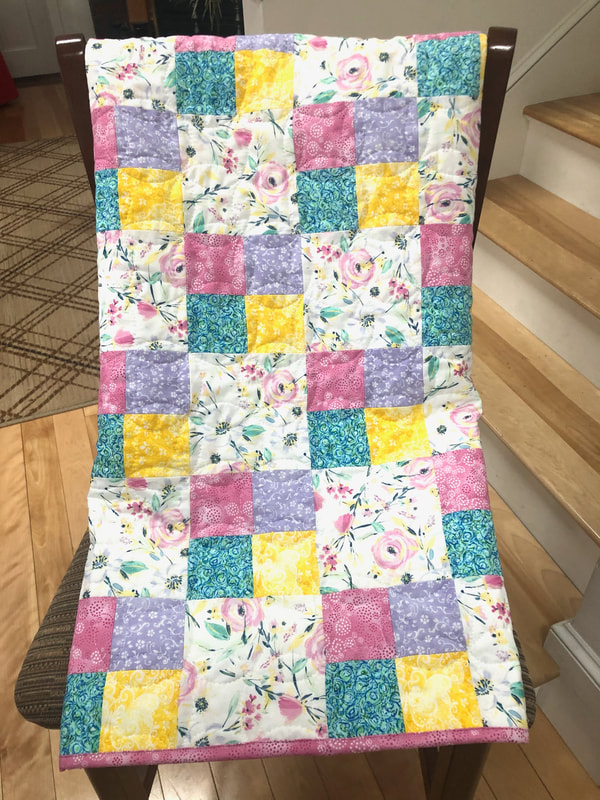 Baby girl quilt in pink, lilac, yellow and teal, for sale, crib quilt.
