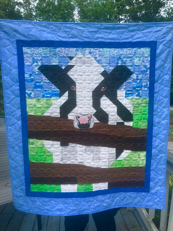 Holstein Cow Quilt from http://www.HomeSewnByCarolyn.com