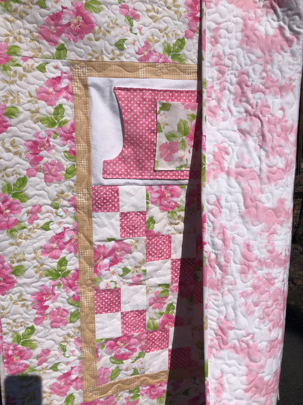 Lovie Lap Quilt with Pockets and flannel backing. 