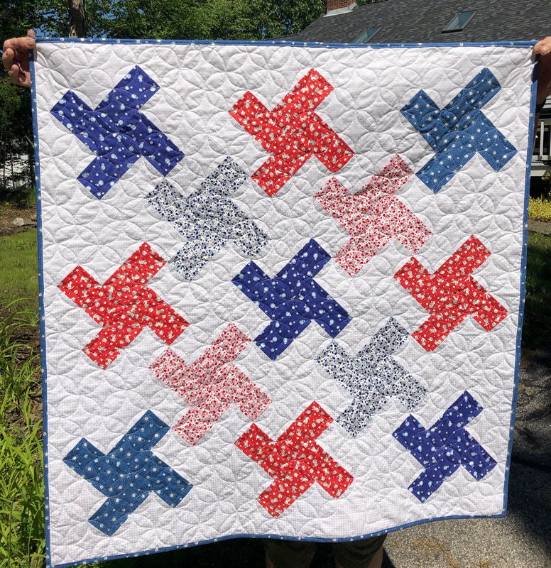 Red, White and Blue Baby Quilt for sale from http://www.HomeSewnByCarolyn.com