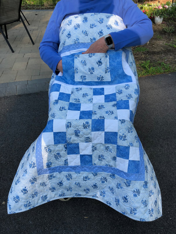 Blue and White Floral Lovie Lap Quilt with Pockets for sale