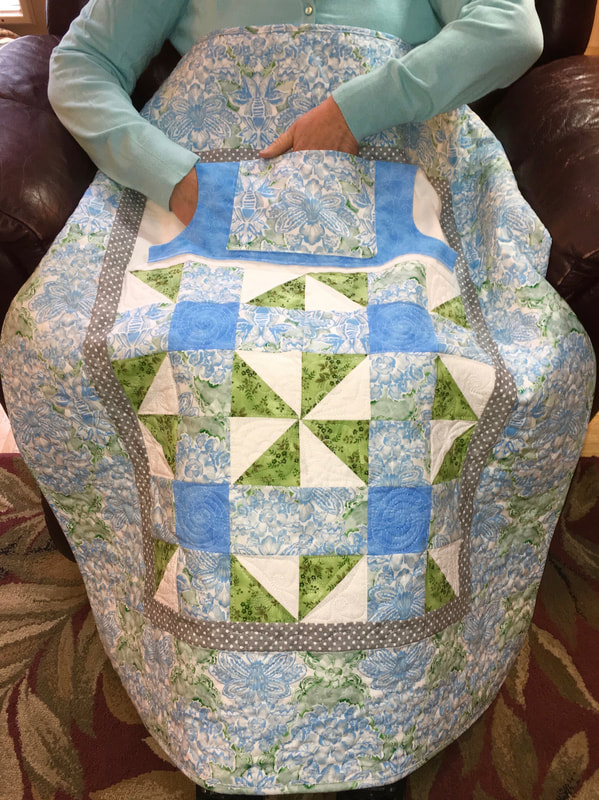 Lovie Lap Quilt with pockets from http://www.HomeSewnByCarolyn.com