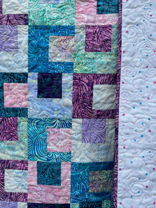 Batik Baby Quilt with flannel backing