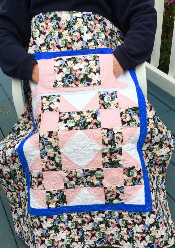 Floral Lovie Lap Quilt with Pockets from http://www.HomeSewnByCarolyn.com