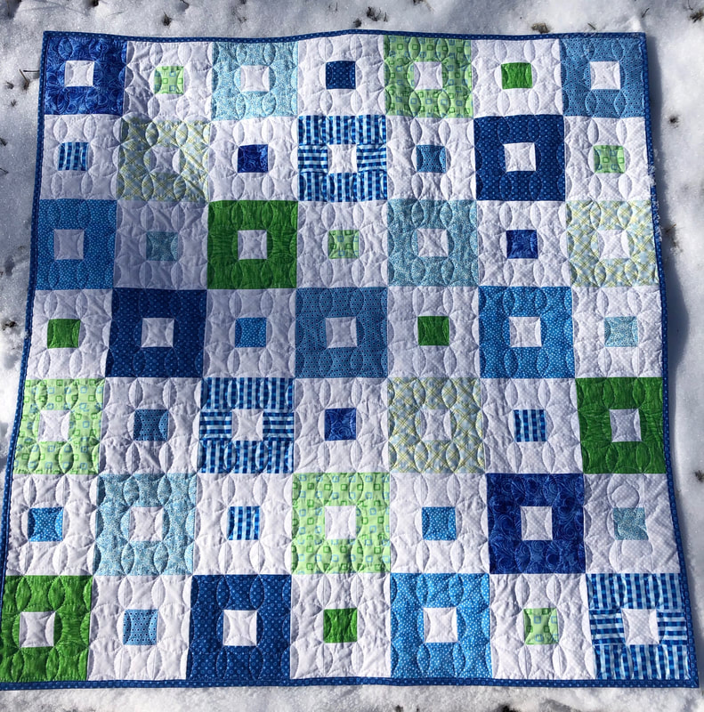 Blue, White and Green Block Baby Quilt for sale from http://www.HomeSewnByCarolyn.com/baby-quilts.html 