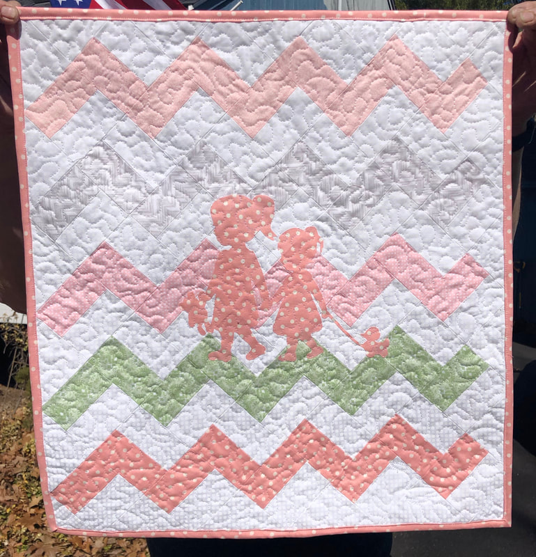 Big Sister Chevron Doll Quilt with silhouette of sisters.