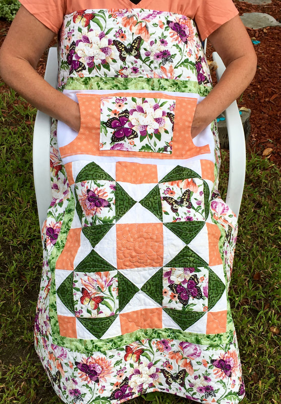 Butterfly Lovie Lap Quilt with Pockets from http://www.HomeSewnByCarolyn.com