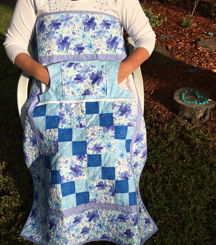 Blue Floral Lovie Lap Quilt with Pockets from http://www.HomeSewnByCarolyn.com